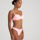Woman stood wearing the Pink Parfait Avero Balconette Bra and Matching Briefs whilst looking off camera