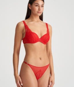 Woman wearing red lace Danae lingerie set