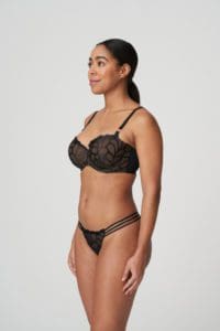 Brunette woman wearing the Prima Donna Aprodisia Twist Collection Lingerie