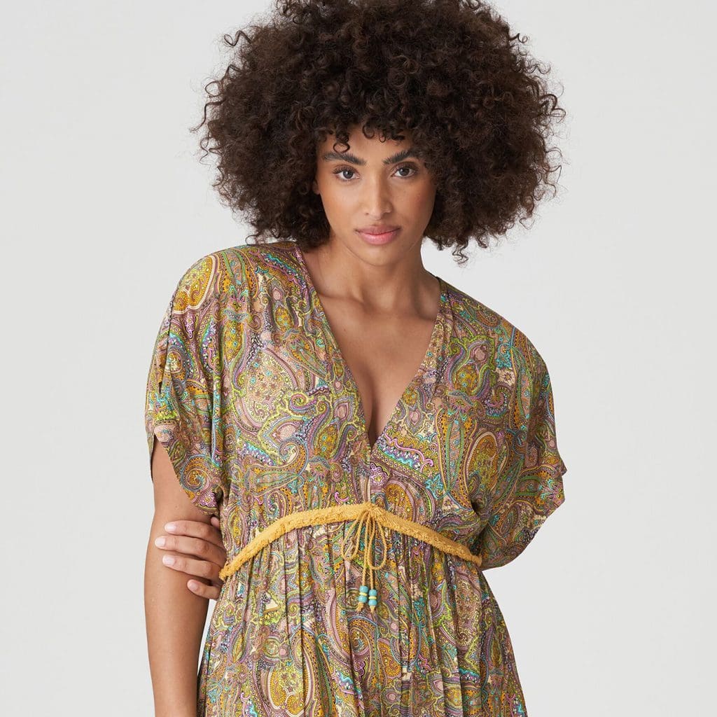 Woman wearing the Sakarun Maxi Dress in Sunny Paisley