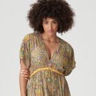 Woman wearing the Sakarun Maxi Dress in Sunny Paisley