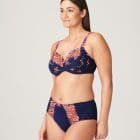 Model wearing Prima Donna bra and brief set in velvet blue