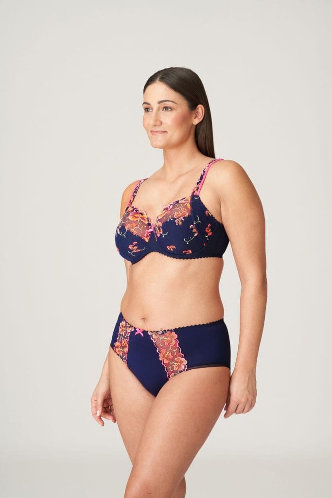 Model wearing Prima Donna bra and brief set in velvet blue